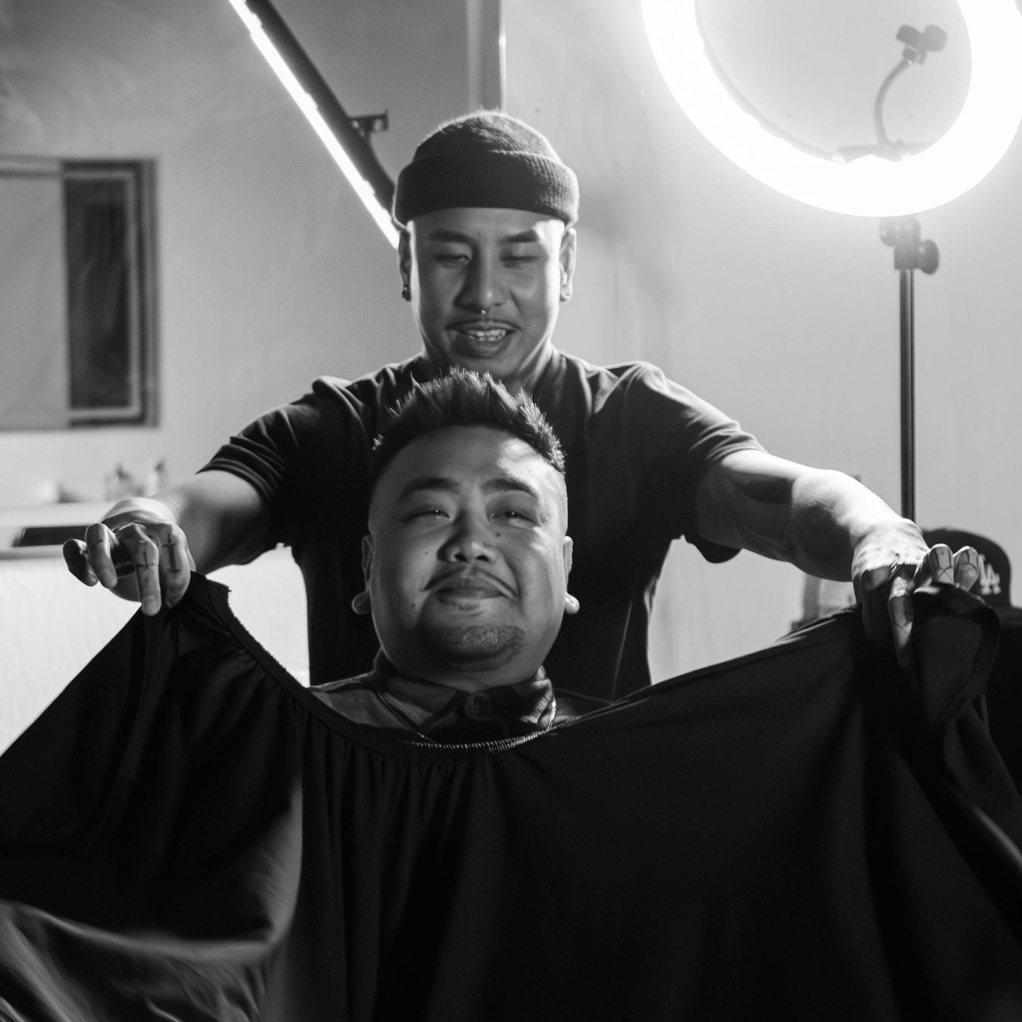 A client getting a haircut at a barber shop in Livermore, CA